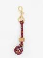 Red handmade braided ball charm featuring a wooden bead and gold metal lobster clasp - Red Pattern (22606)
