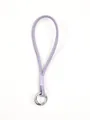 Detail of purple textured phone wrist strap with silver metal clasp attachment - Lavender