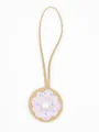 Close-up of a cute PU leather doughnut bag charm with pink icing and colorful sprinkles. - Pink