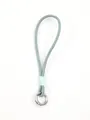 Close-up of blue leather phone wrist strap with silver metal ring and thread detail - Grey Blue