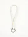 Close-up view of a white leather phone wrist strap featuring a silver metal ring - White