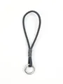 Close-up of grey braided mobile phone wrist strap with silver metal ring connector - Dark Gray
