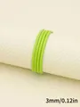 Close-up view of 3mm neon green faux sheepskin stitched cord for DIY jewelry making - 3mm x 1m / Fluorescent Green (00321)