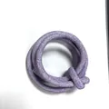 Macro detail of purple stitched PU leather round cord for DIY bag straps and belts - Purple (00005)