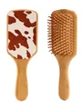 Detailed front and back view of bamboo hair brush with cow print leather finish - Furry Texture Style (41296)