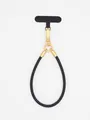 Detailed view of a premium minimalist black PU leather phone lanyard with gold metal clasp - Black