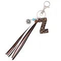 Leopard print leather letter Z keychain with colorful velvet tassel and sunflower charm - Letter Z / Leopard Print