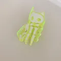Detailed view of neon yellow acrylic hair claw clip featuring a cat skeleton design - Skeleton Cat (ZY2170) / Green