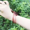 Five-layer copper colored jelly bangles made of silicone tube with a brown silk ribbon bow - 5 Pieces / Copper (14#)