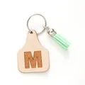 Personalized beige leather tag keychain with letter M and mint green velvet tassel - Letter M Style (20443)