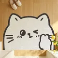 Simpatico zerbino a forma di gatto che fa l'occhiolino per l'ingresso su pavimento in legno - 40x60cm / Gatto che Fa l'Occhiolino
