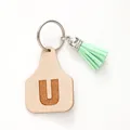 Minimalist personalized leather keychain with embossed letter U and mint green tassel charm - Letter U Style (20451)