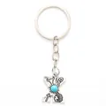 Vintage Western alloy letter X keychain featuring natural turquoise bead and unique engravings - 20501