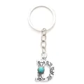 Antique silver letter D keychain featuring western engravings and a turquoise stone inlay - 20485