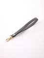 Elegant grey faux leather wristlet strap with a durable golden metal lobster clasp - Gray