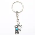Western style vintage alloy letter F keychain featuring turquoise stone and sunflower - 20487