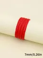 Close-up detail of 7mm red braided PU leather cord with fine three-strand weave texture - Three-Strand Twisted Style (00328)