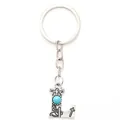 Western style silver-toned alloy keychain featuring letter L pendant and blue turquoise stone. - 20491