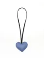 Detailed view of a cute blue leather heart-shaped bag charm with black strap - Heart Charm / Blue