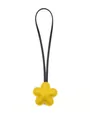 Close-up of a cute yellow flower leather bag charm with a long black strap. - Flower Charm / Yellow