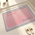 Soft pink linen woven absorbent bath mat featuring non-slip backing and bathroom text - 40x60cm / Pink Blue-Square