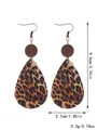 Detailed view of leopard print teardrop leather earrings showing 9.5cm length and weight. - Leopard Print Teardrop (11655)