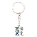 Vintage silver alloy letter R keychain with blue turquoise bead and engraved sun symbols - 20496