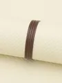 Close-up view of brown four-strand flat PU leather cord for DIY jewelry and necklaces - 2.5mm*2mm (1 Meter/Pack) / Dark Coffee (00358)