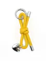 Detailed view of yellow leather cord knot keychain featuring a silver heart pendant - Woven Lanyard (21672)