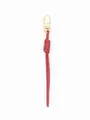Detail view of a red hand-braided PU leather keychain with a gold lobster clasp. - Red