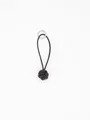 Close-up of handmade dark brown leather monkey fist knot keychain charm with silver ring - Dark Coffee (22128)