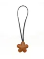 Elegant brown flower-shaped leather bag charm with a slim black cord accessory - Flower Charm / Brown