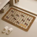 Woven linen-style bathroom floor mat featuring a cute dachshund pattern and warm earth tones. - Rounded Rectangle / 40x60cm / Retro Dog Brown