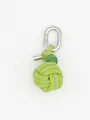 Close-up of lime green handcrafted woven leather ball keychain with silver carabiner - Woven Ball Charm (22624)