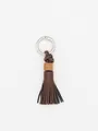 Handmade brown PU leather tassel keychain with wooden bead and silver ring for bag decor. - Woven Tassel (22411) / Dark Brown