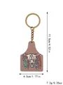 Detail view of Western farm style wooden keychain with cow skull print and dimensions. - Bull Skull Ear Tag Style (20329)