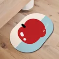 Alfombra de baño ovalada de tierra de diatomeas con diseño de manzana roja y azul - 50*80cm (Tierra de Diatomeas Engrosada) / Manzana