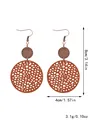 Boucles d'oreilles bohèmes vintage en cuir ajouré avec disques en bois brun - Style (11492)
