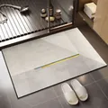 Modern minimalist absorbent bathroom mat with geometric stripes and yellow accents. - Yanli (Gray and Yellow Patchwork)