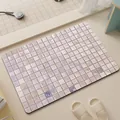 Absorbent bathroom floor mat with purple mosaic tile pattern in a modern bathroom - Purple Dream
