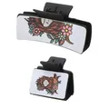 Detail view of two black hair claws with highland cow and floral leather inserts - White Highland Cow Pattern (90188) / Two-Piece Set / 90188