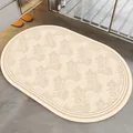 Detailed view of oval American style bath mat with elegant beige floral pattern - 40*60cm / Standard Diatom Mud / American Style B