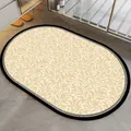 Close-up of an American style oval non-slip bathroom mat with elegant leaf patterns. - 40*60cm / Standard Diatom Mud / American Style C