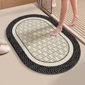 Alfombra de baño ovalada antideslizante con centro texturizado crema y borde negro - Rima Simple / Ovalado (40*60cm)