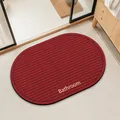 Alfombra de baño roja ovalada de tierra de diatomeas con texto Bathroom y rayas antideslizantes - 40*60cm / Ovalado / Ajuste regular / Rojo