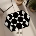 Moderne sechseckige geometrische Badematte in Schwarz-Weiß-Muster für Bad oder Flur - Impressionistischer Stil K