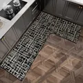 Tappeto da cucina a L antiscivolo con moderno motivo astratto strutturato nero e bianco. - Tono Nero - Sinistra