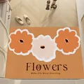 Modern floral entrance mat with orange and cream flowers for anti-slip home decor - 40*60cm / Warm orange base with abstract floral design