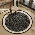 Elegant round floral pattern rug in black and cream for vanity desk or bedroom area - Diameter 60cm / Shadow Flower Weave