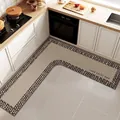 L-shaped anti-slip kitchen floor mat in beige leather with brown pebble border design - Plaid